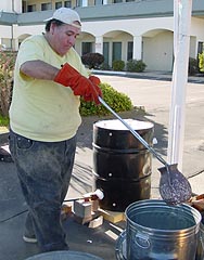 Adrian Castelo preparing for Raku firing