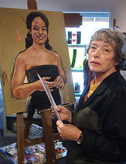 Mary Jane Brewster working on her portrait of Camille Cole.