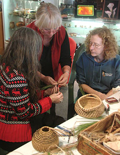 Carol Wagner demonstrating basket start techniques to Judy DeRosa and Gloria Garland.