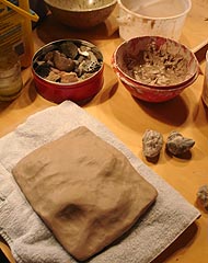 The prepared slab with rocks arranged underneath, ready for drawing