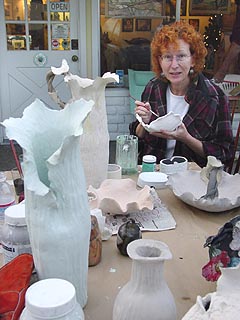 Gloria Garland AKA "Doc"  glazing a tray